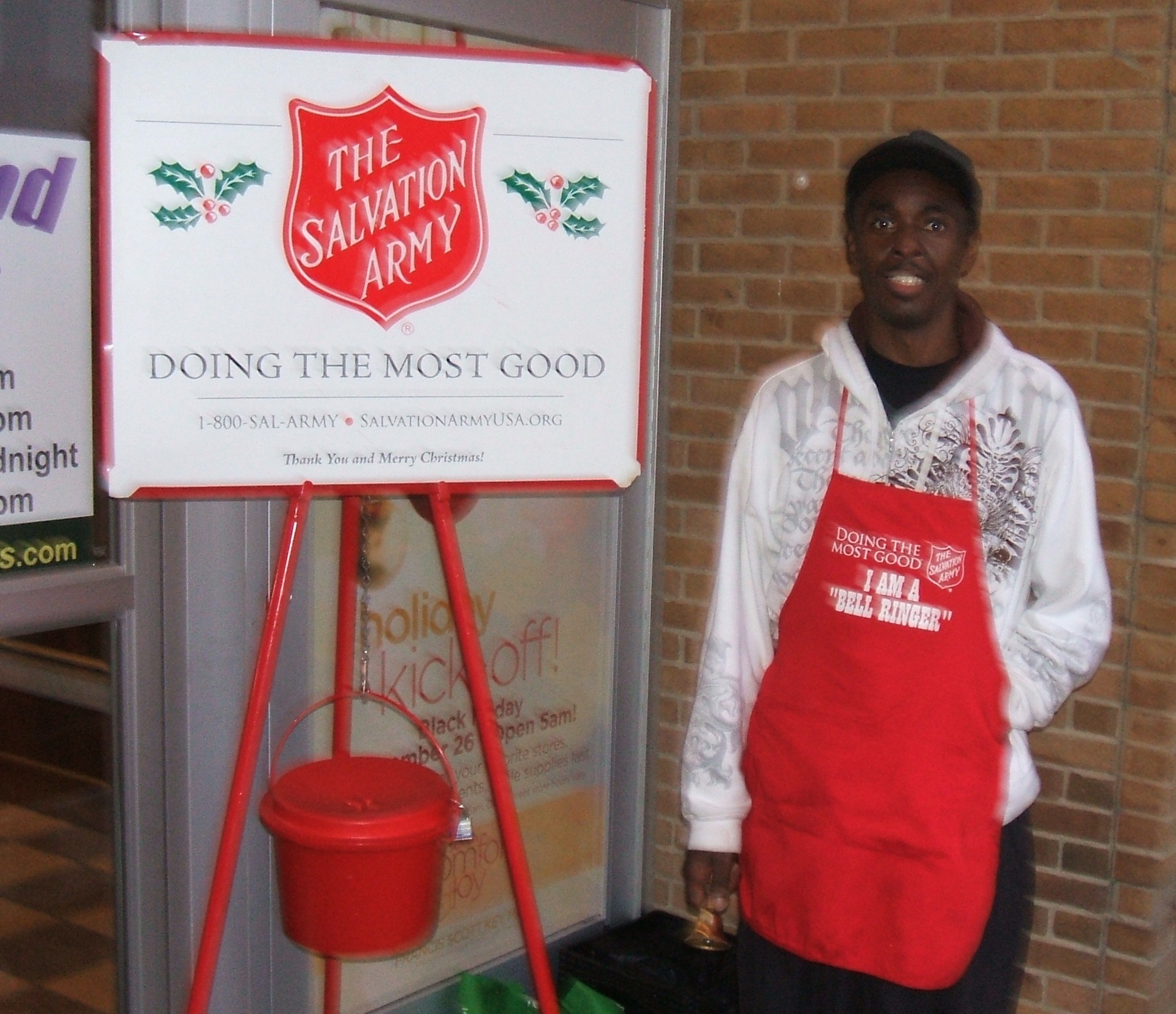 Salvation Army Bellringer collecting donations at a Francis Scott Key Mall entrance